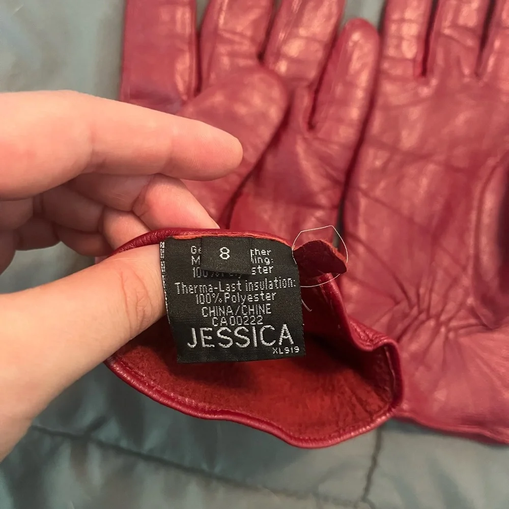 Red leather gloves with buckle detailing